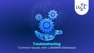 A digital wireframe hand holding three blue gears, symbolizing problem-solving, with the text 'Troubleshooting Common Issues with LoRaWAN Gateways' on a blue background.